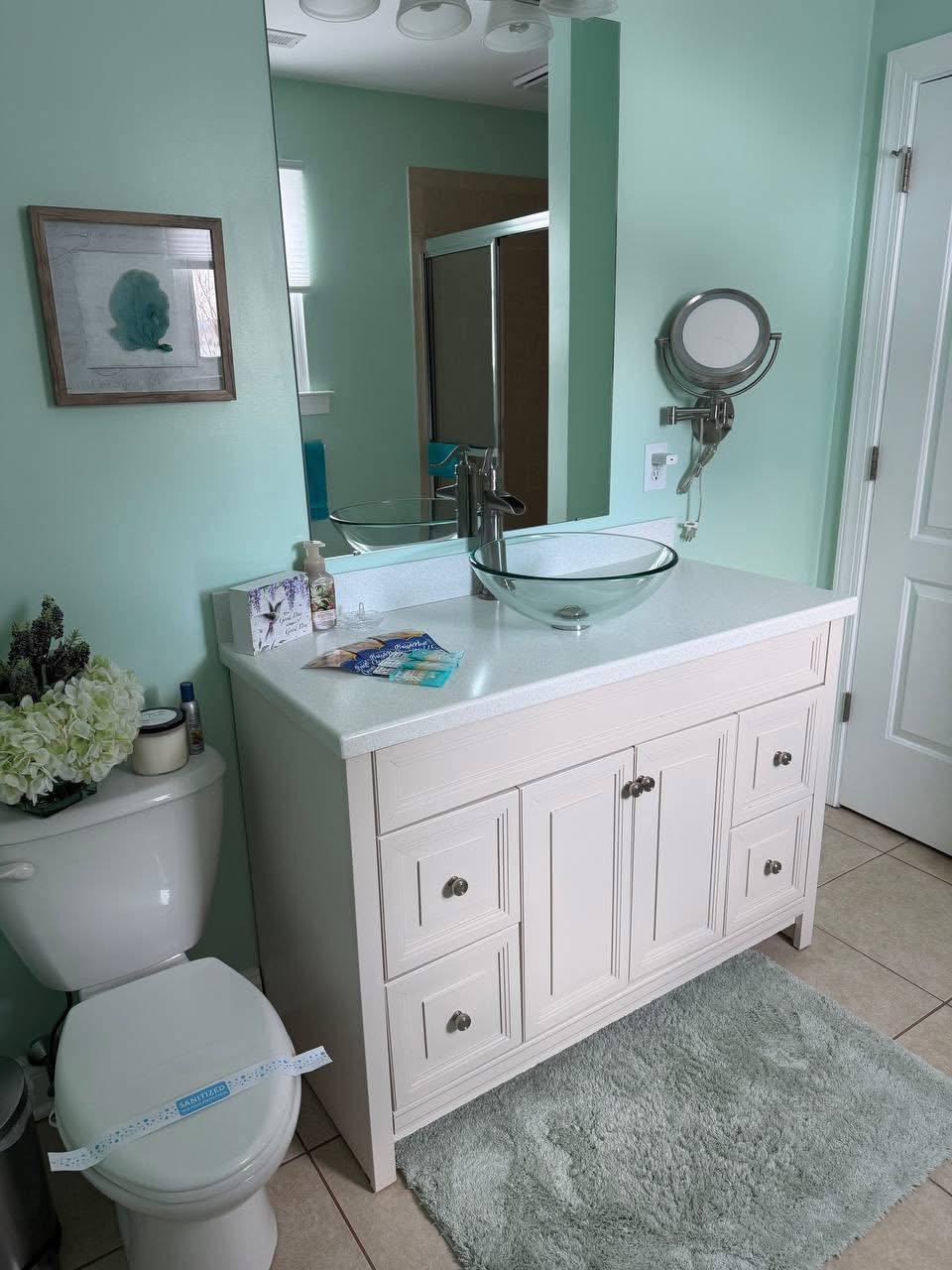 White bathroom vanity detailed and sanitized